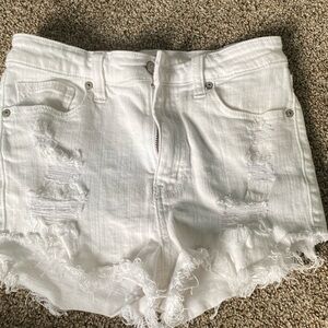 White distressed jean shorts